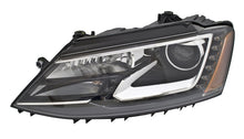 Load image into Gallery viewer, Hella 2013-2014 Volkswagen Jetta Headlight Assembly